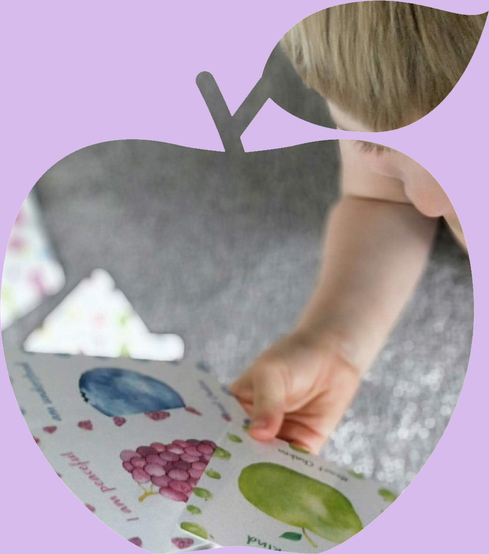 Fruitful feelings image of a child looking at chakra cards